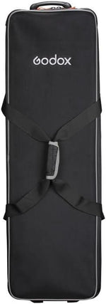 Black Godox camera bag with a strap on a white background