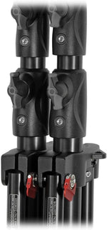 Close-up of a black tripod with adjustable legs on a white background