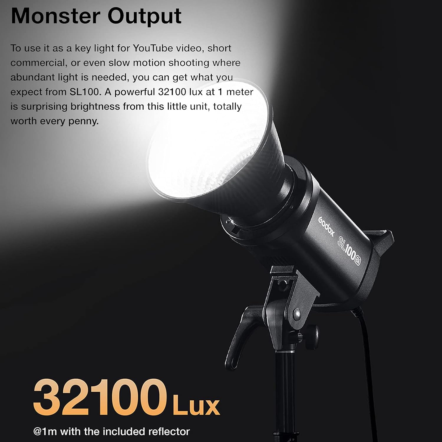 Studio light with '32100 Lux' rating on a dark background