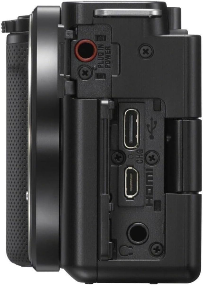 Back view of a black camera body with ports and connectors on a white background