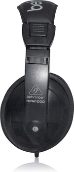 Black headphones with Behringer logo on a white background