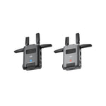 Two DJI wireless transmitters on a white background
