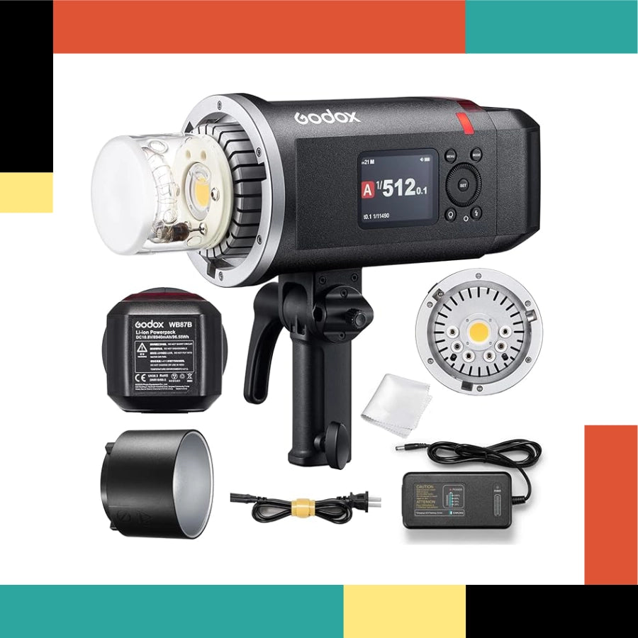 Godox studio light equipment with accessories on a colorful background