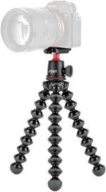 Camera on a Joby gorilla pod with a white background