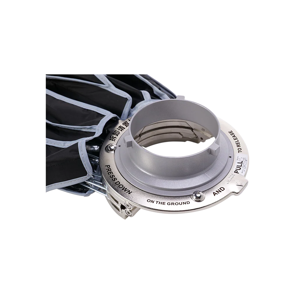 Close-up of a metal component with text on a white background