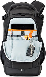 Black backpack with open front compartment showing light blue interior and items inside.