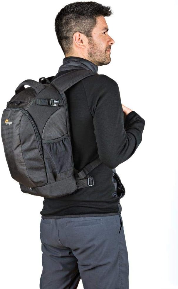 Man wearing a gray backpack on a white background
