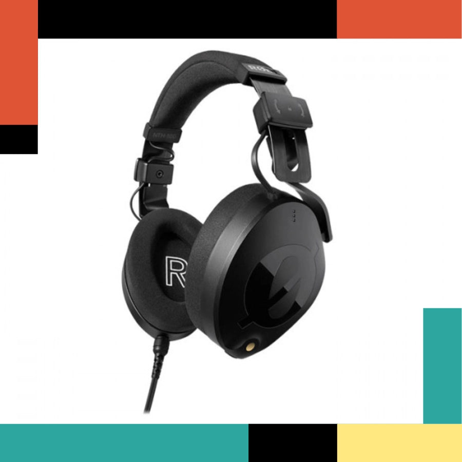 Black headphones with a brand logo on a multicolored background