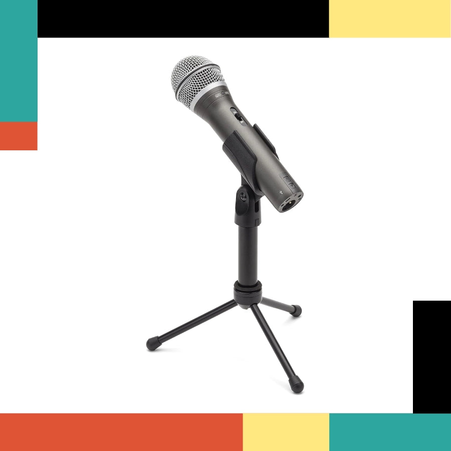 Microphone on a stand with a colorful geometric background