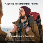 Man with a magnetic neck mount for phone on a beach