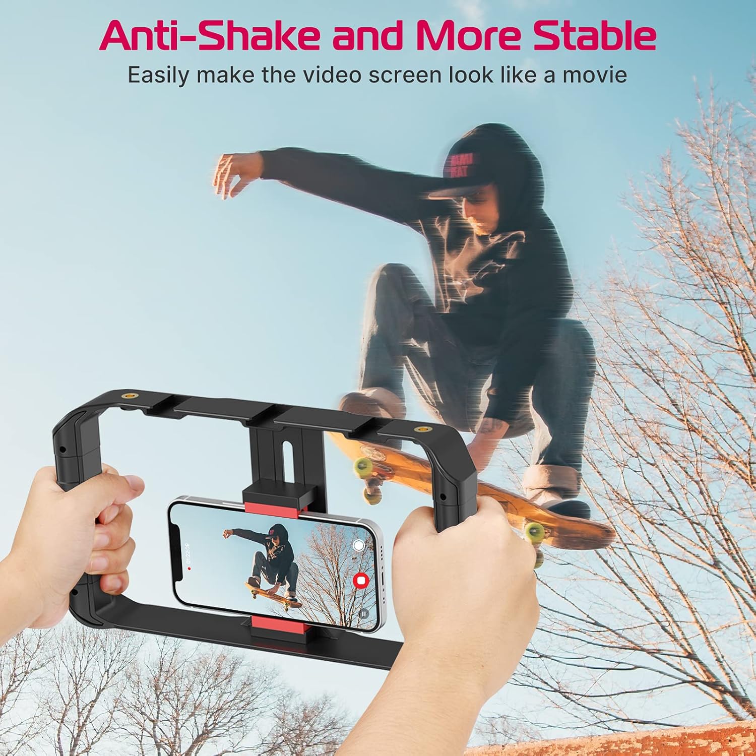 Person skateboarding with a smartphone stabilizer against a clear sky.