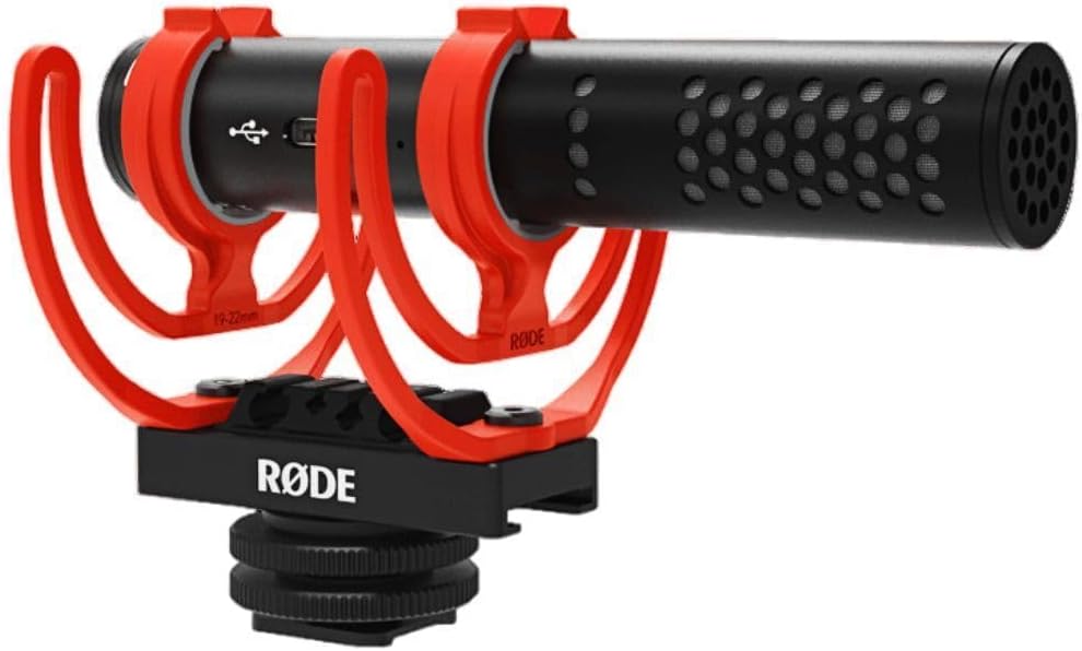 Rode microphone with red shock mount on a white background